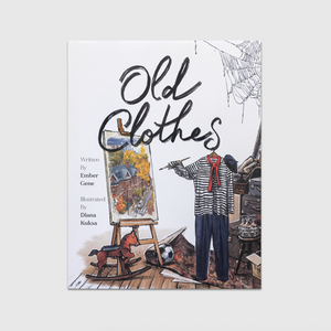 Illustrated cover of the children’s book Old Clothes featuring vintage bodiless clothing in an attic scene, including a striped shirt with a red scarf, blue pants, stacked suitcases, a rocking horse, and an easel painting. The title “Old Clothes” appears in large handwritten black lettering across the top.